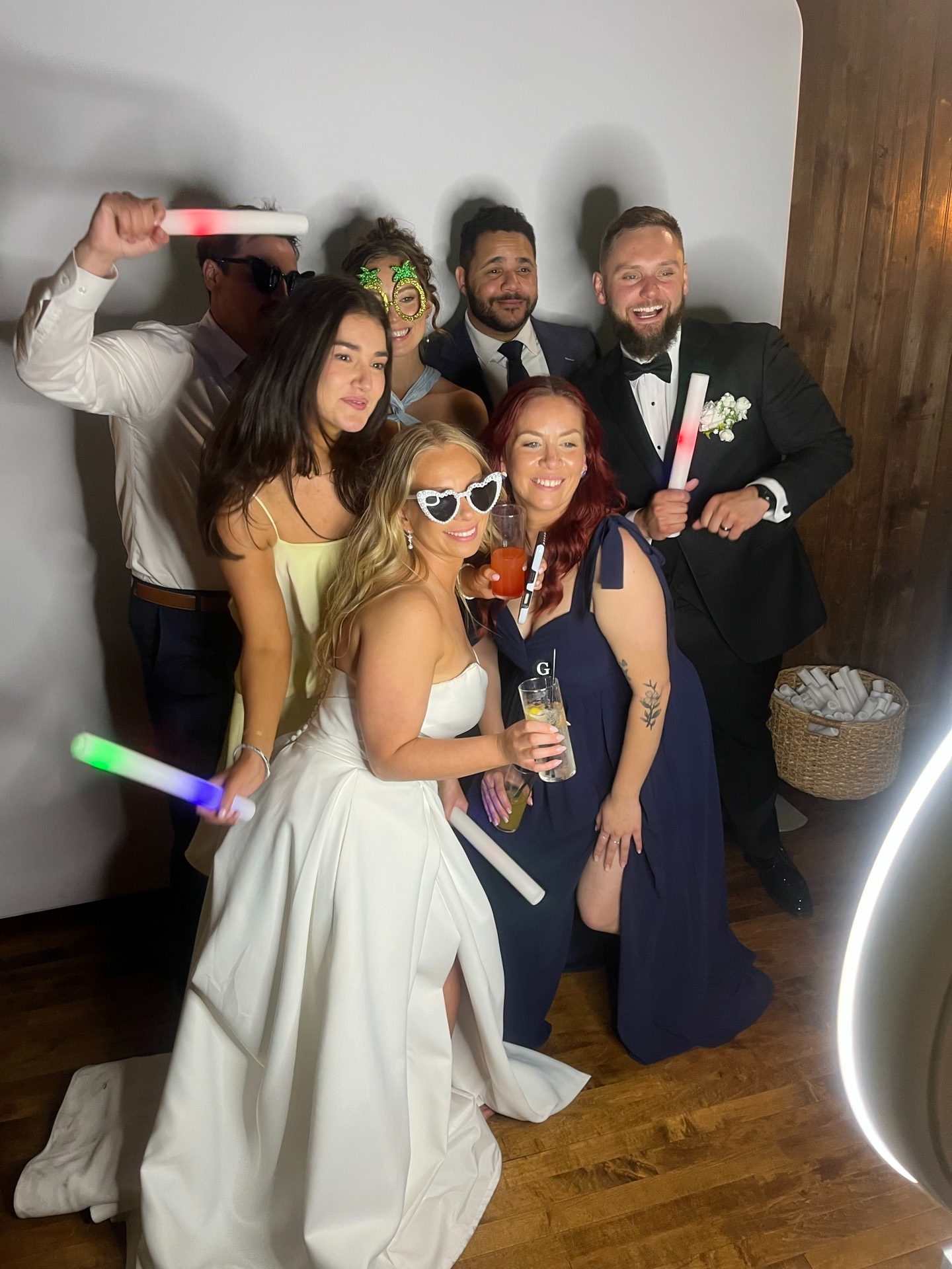 Wedding guests posing in the Accent photo booth